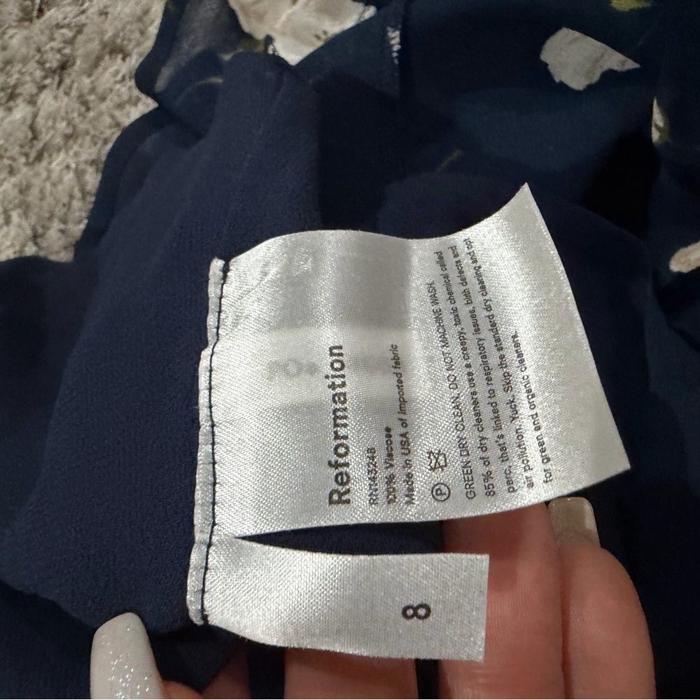Reformation Navy Floral Mini Dress with white flowers. Picture shown for style. - Picture 3 of 5